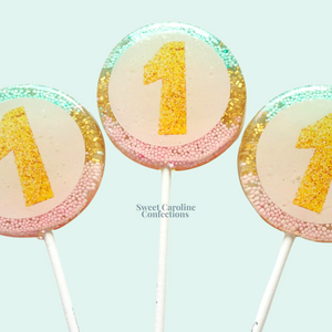 00365 EDIBLE WITH OMBRE AQUA, GOLD AND LIGHT PINK IN THE BACK - Sweet Caroline Confections | The Original Sparkle Lollipops